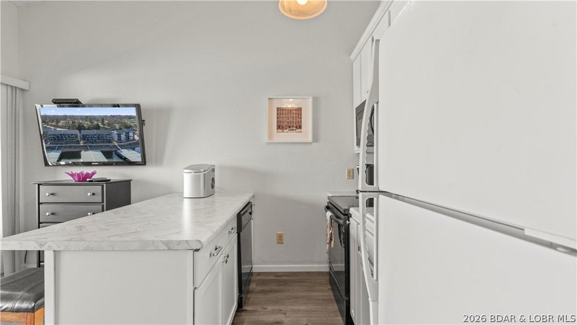 Experience the ultimate lake lifestyle at Heron Bay, a premier - photo 8