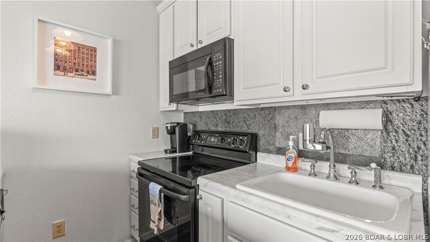 Experience the ultimate lake lifestyle at Heron Bay, a premier - photo 9