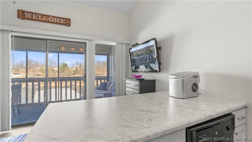 Experience the ultimate lake lifestyle at Heron Bay, a premier - photo 10