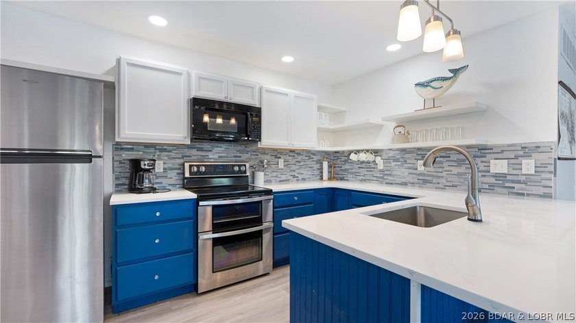 Lakefront living in a wide, quiet cove on the Gravois Arm! - photo 6