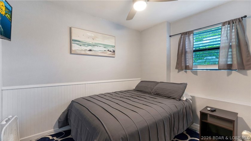 Lakefront living in a wide, quiet cove on the Gravois Arm! - photo 9