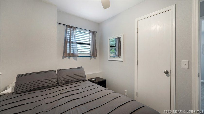 Lakefront living in a wide, quiet cove on the Gravois Arm! - photo 10