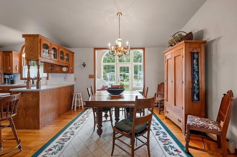 Beautiful arched-window entry welcomes you to this inviting lake - photo 14