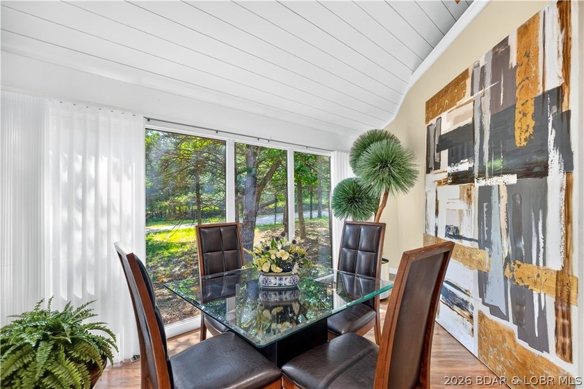 Distinctive architecture meets effortless lake living in this - photo 19