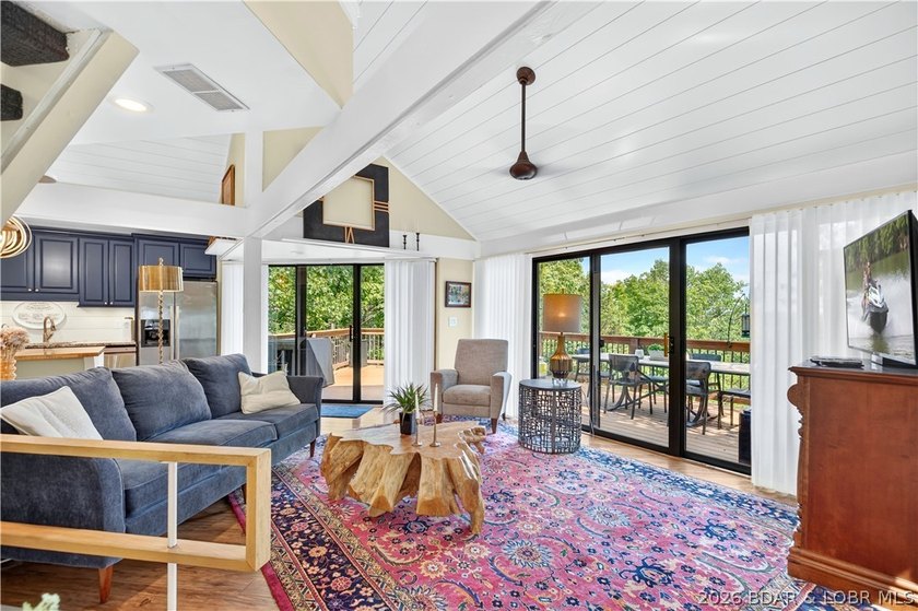 Distinctive architecture meets effortless lake living in this - photo 22