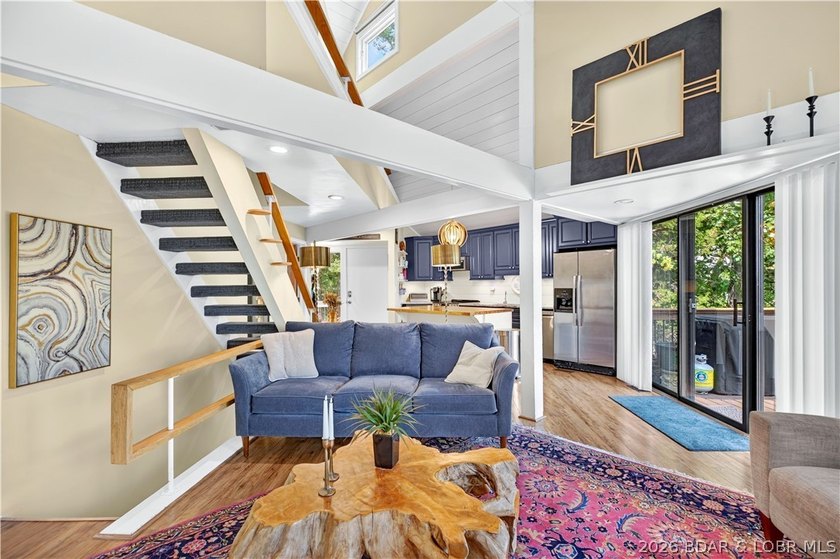 Distinctive architecture meets effortless lake living in this - photo 24