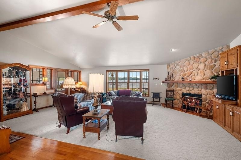 Beautiful arched-window entry welcomes you to this inviting lake - photo 25