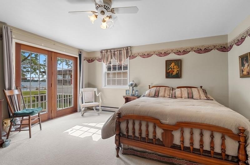 Beautiful arched-window entry welcomes you to this inviting lake - photo 30
