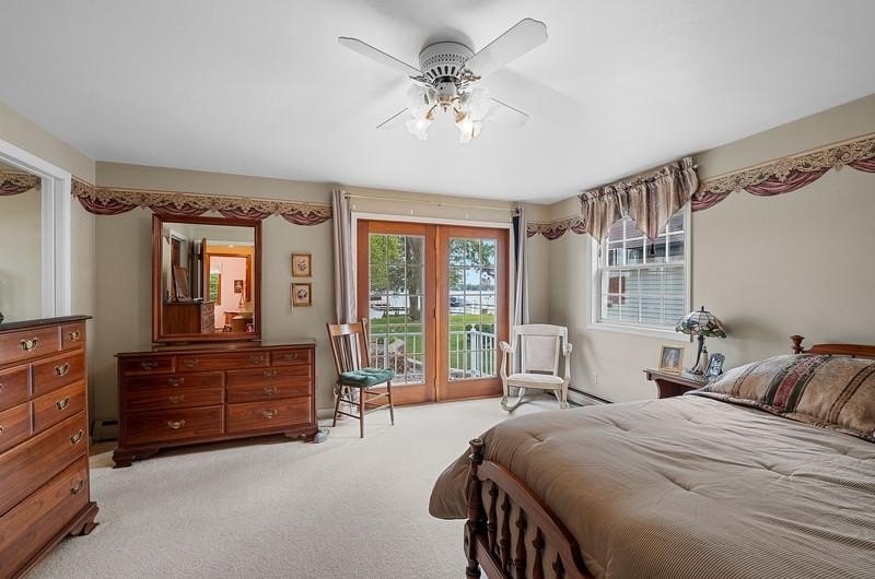 Beautiful arched-window entry welcomes you to this inviting lake - photo 32