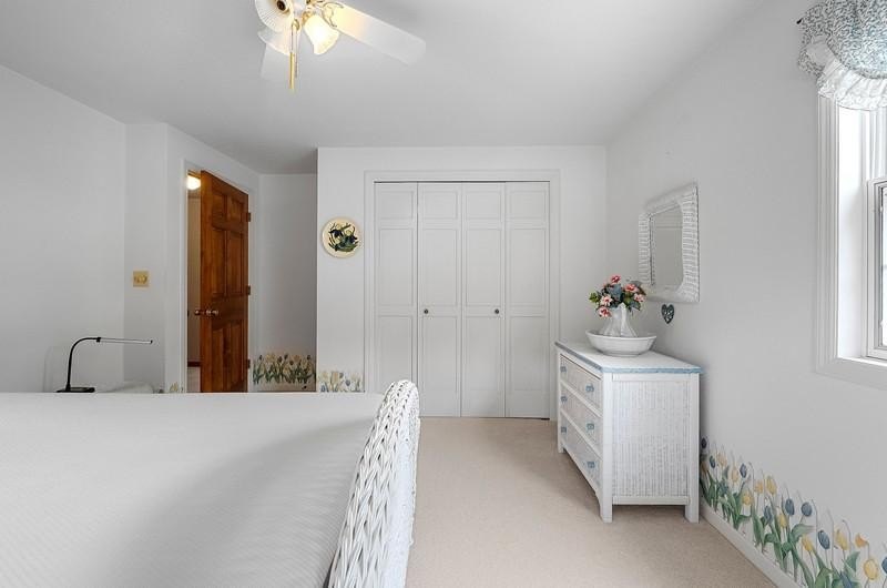 Beautiful arched-window entry welcomes you to this inviting lake - photo 36