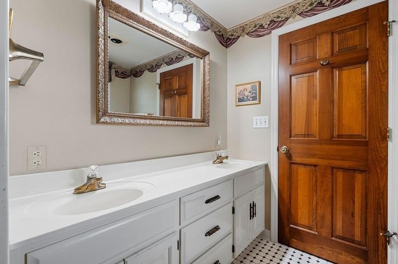 Beautiful arched-window entry welcomes you to this inviting lake - photo 37