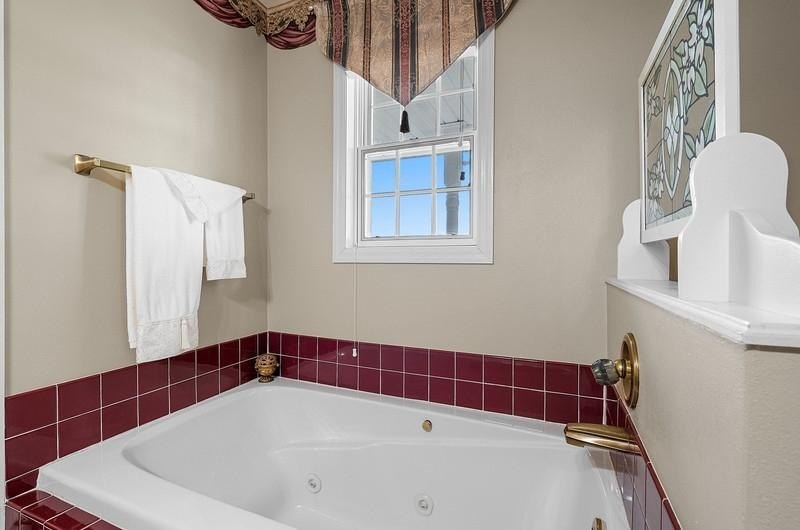 Beautiful arched-window entry welcomes you to this inviting lake - photo 39