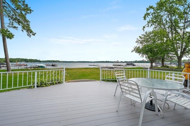 Beautiful arched-window entry welcomes you to this inviting lake - photo 47