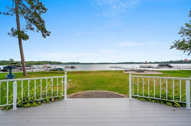 Beautiful arched-window entry welcomes you to this inviting lake - photo 49