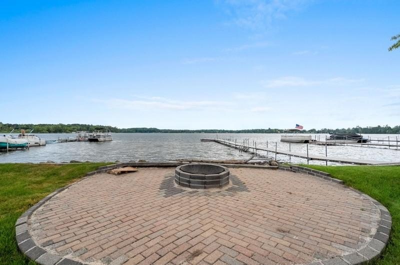 Beautiful arched-window entry welcomes you to this inviting lake - photo 50