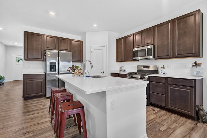 Highly sought-after Wren floor plan by Lennar, built in 2023 and - photo 8