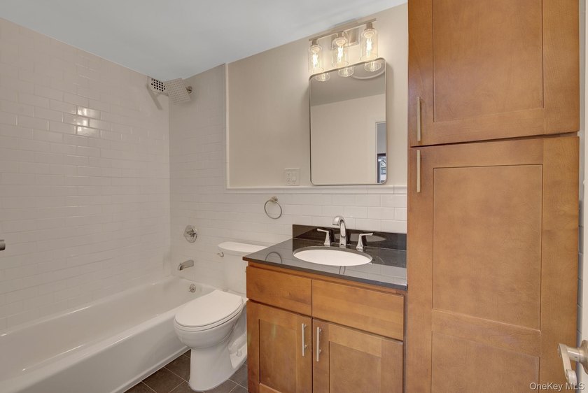 Move right into this updated 3-bedroom, Co-op in Le Havre in - photo 11