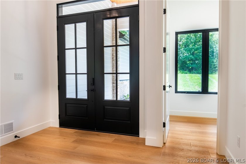 NEW CONSTRUCTION in Porto Cima! This modern ranch delivers the - photo 13