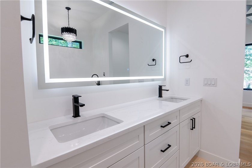 NEW CONSTRUCTION in Porto Cima! This modern ranch delivers the - photo 32