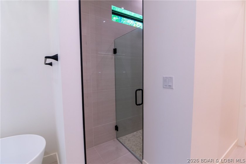 NEW CONSTRUCTION in Porto Cima! This modern ranch delivers the - photo 35