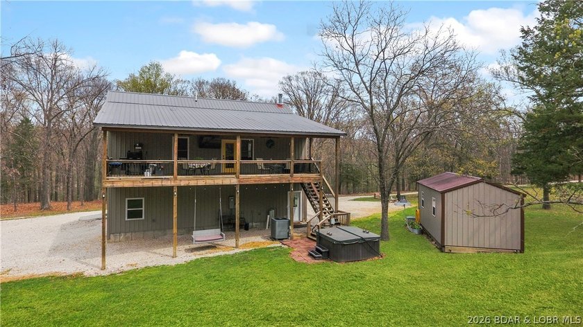 Situated on 4.43 acres just minutes from Camdenton, this - photo 5