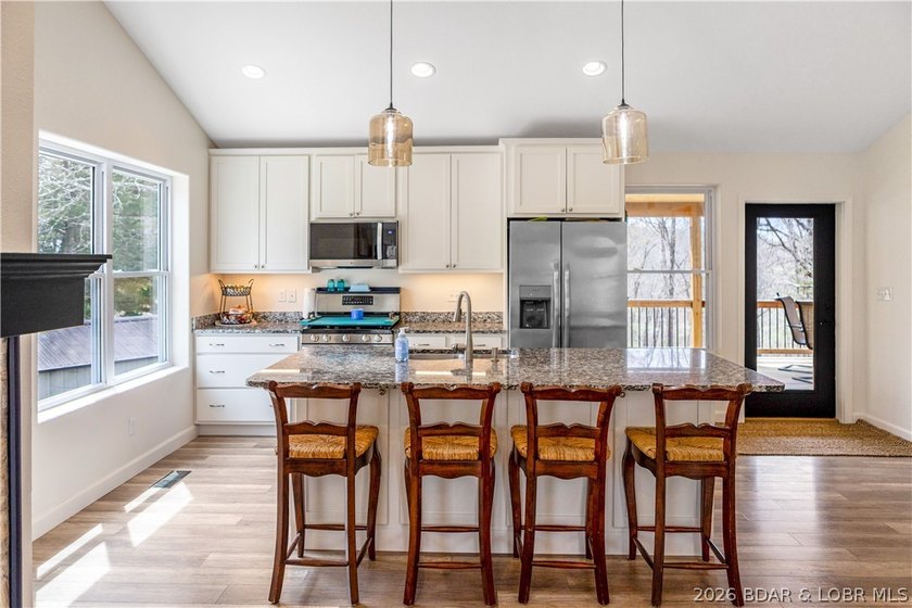 Situated on 4.43 acres just minutes from Camdenton, this - photo 10