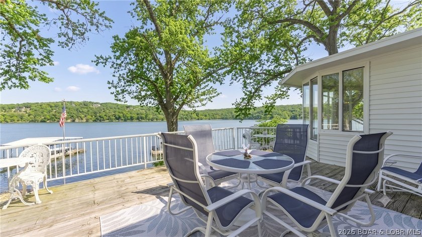 Darling lakefront GEM, cherished by one family for years is now - photo 4