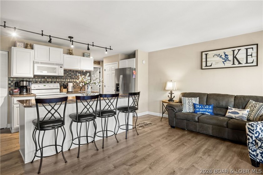 The perfect blend of luxury &amp; income potential in the heart of - photo 4