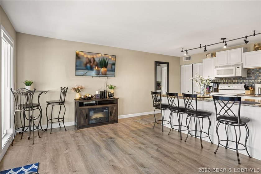 The perfect blend of luxury &amp; income potential in the heart of - photo 7