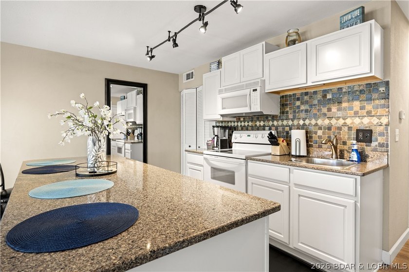The perfect blend of luxury &amp; income potential in the heart of - photo 10