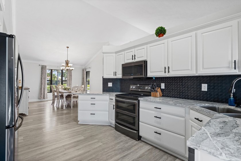 Welcome to Palm City's best-kept secrets! Nestled in highly - photo 11