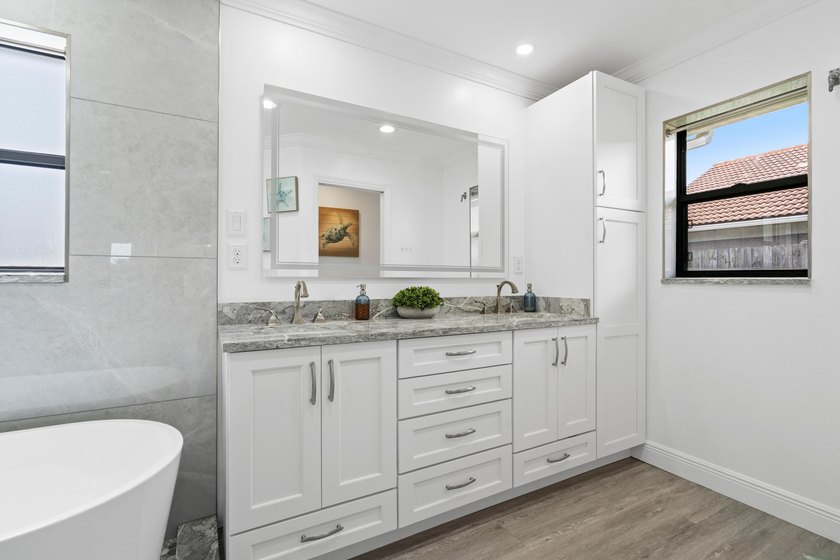 Welcome to Palm City's best-kept secrets! Nestled in highly - photo 20
