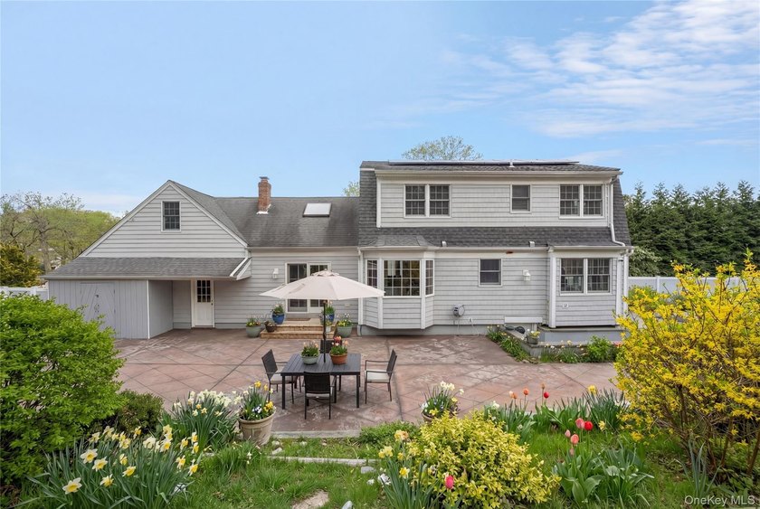 Set within the serene landscape of Rolling Woods in Riverhead - photo 7