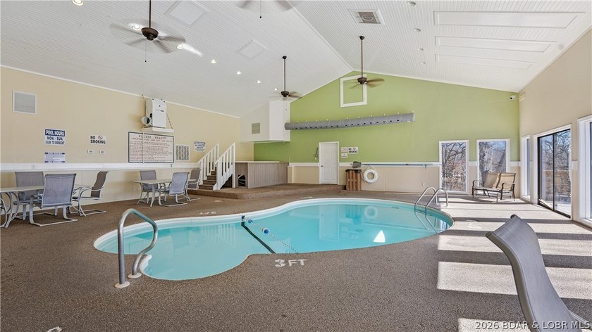 Escape to the stunning Lake of the Ozarks with this charming - photo 4