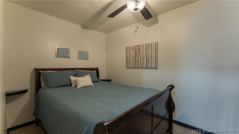 Escape to the stunning Lake of the Ozarks with this charming - photo 10