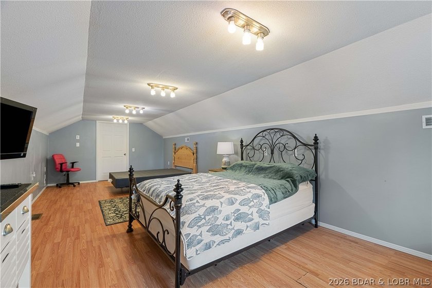 Hard-to-find one-level lakefront living at the 49-mile marker! - photo 45