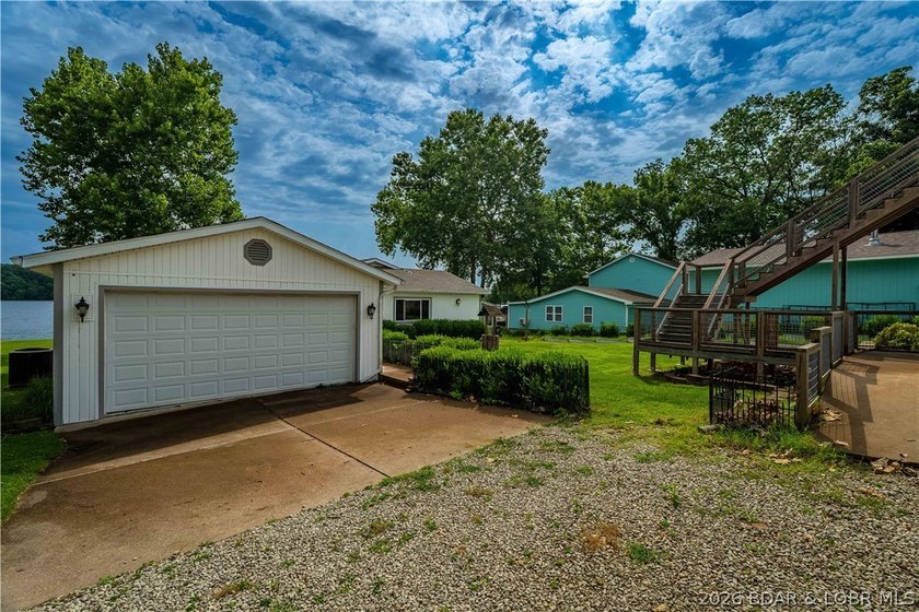 Hard-to-find one-level lakefront living at the 49-mile marker! - photo 49
