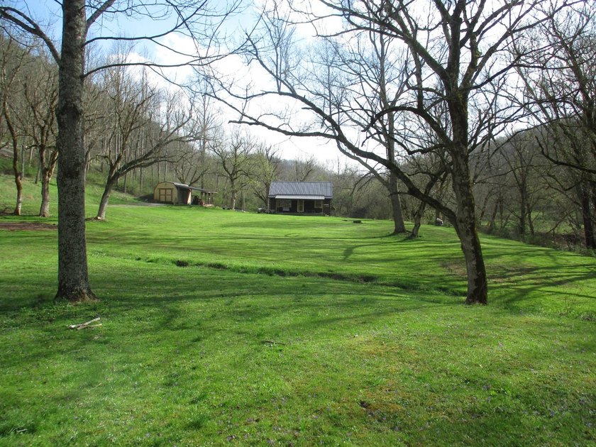 This log home is sitting on 2.27 acres, more or less, and is - photo 4