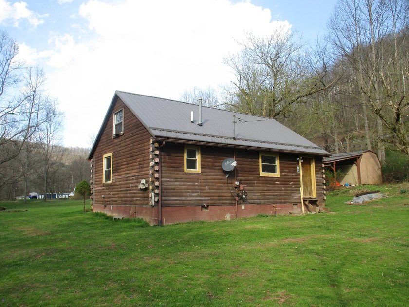 This log home is sitting on 2.27 acres, more or less, and is - photo 6