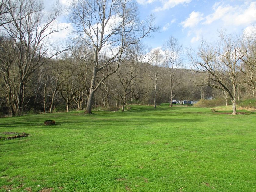 This log home is sitting on 2.27 acres, more or less, and is - photo 7