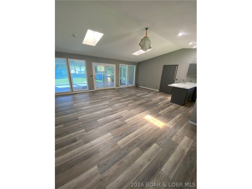 This home checks a lot of boxes: Location, blacktop to your door - photo 8