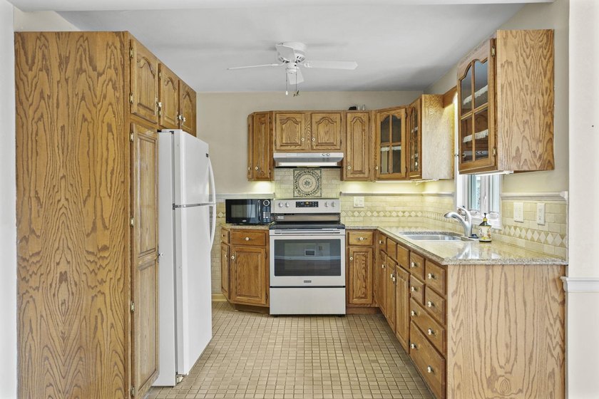 Welcome home to this charming 1 1/2-story home in the heart of - photo 11