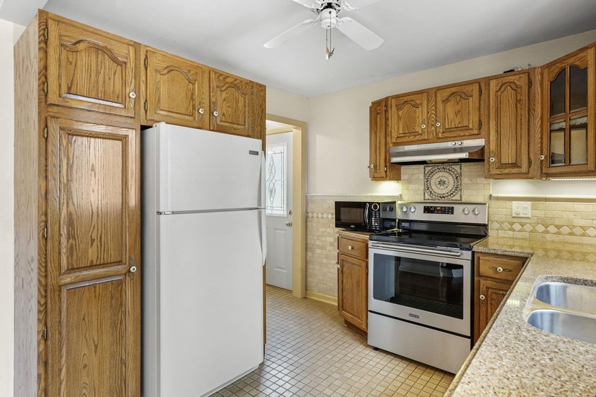 Welcome home to this charming 1 1/2-story home in the heart of - photo 12