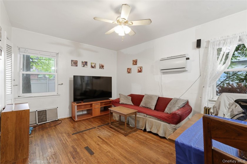 Charming brick home in tree-lined Oakland Gardens. This - photo 9