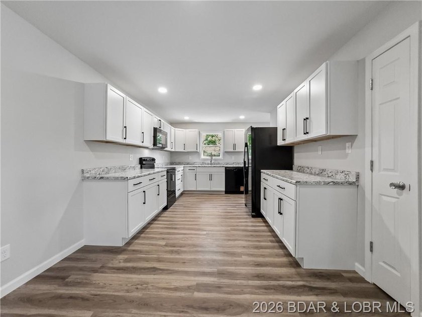 Completely rebuilt from the ground up, 5-bed, 3-bath home in - photo 7