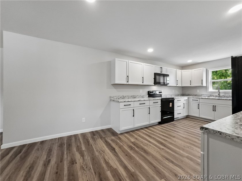 Completely rebuilt from the ground up, 5-bed, 3-bath home in - photo 8