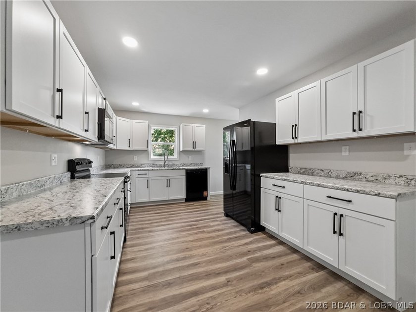 Completely rebuilt from the ground up, 5-bed, 3-bath home in - photo 9
