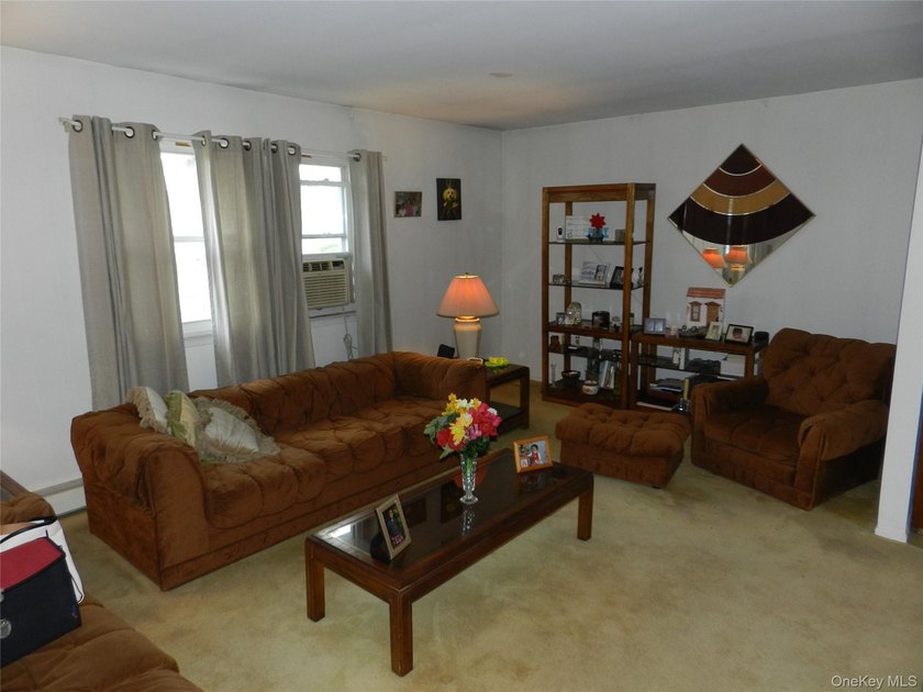Spacious 4 Bedroom, 2 Bath High Ranch with Garage.Large Living - photo 3