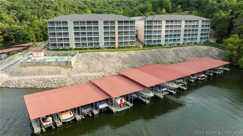 Wake up to peaceful cove views from your screened deck at this - photo 2
