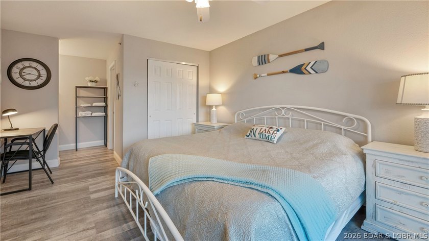 Wake up to peaceful cove views from your screened deck at this - photo 9